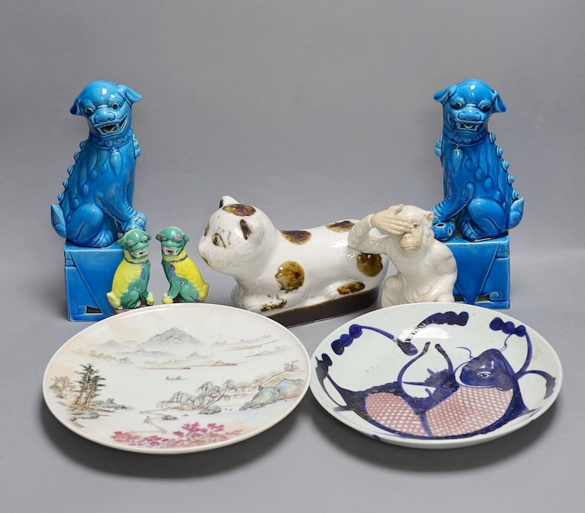 A pair of Chinese turquoise glazed lion dogs, 26.5cm, two Chinese dishes other Oriental ceramics etc.